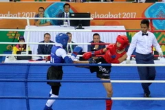 Yến Ly áp đảo đối thủ Iran để mang về Huy chương vàng kế tiếp cho đoàn thể thao Việt Nam. (Ảnh: Hữu Bình)