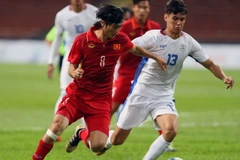 HLV Hữu Thắng tin rằng thử thách thực sự vẫn đang chờ U22 Việt Nam ở phía trước. (Ảnh: Quốc Khánh/TTXVN)