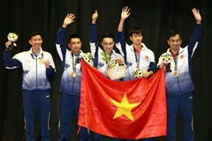 Bóng bàn Việt Nam đã làm nên lịch sử khi đánh bại người Singapore. (Ảnh: Zing)