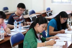 Các giáo viên chấm thi tại trường Đại học Sư Phạm TP. Hồ Chí Minh. (Ảnh: Phương Vy/TTXVN)