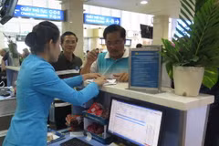 Sân bay Tân Sơn Nhất hoạt động ổn định trở lại sau sự cố tin tặc. (Ảnh: Hoàng Hải/TTXVN)