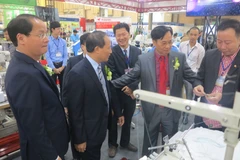 Triển lãm Quốc tế Công nghiệp Dệt may, thiết bị và Nguyên phụ liệu 2016. (Ảnh: Đức Duy/Vietnam+)