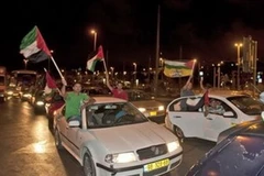 Người dân Palestine đổ ra đường phố Jerusalem ngày 23/9. (Nguồn: AP)