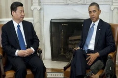 Tổng thống Mỹ Barack Obama (phải) và Phó Chủ tịch nước Trung Quốc Tập Cận Bình trong cuộc gặp tại Nhà Trắng ngày 14/2. (Nguồn: Getty)