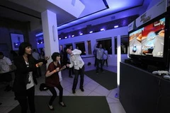 Kinect cho phép người dùng tương tác với Xbox 360 bằng những chuyển động toàn thân. (Nguồn: Reuters)