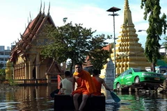 Cảnh ngập lụt tại Bangkok. (Ảnh: AFP/TTXVN)