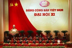 Đoàn Chủ tịch tại lễ khai mạc Đại hội Đảng. (Ảnh: TTXVN)