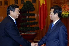 Thủ tướng Nguyễn Tấn Dũng tiếp ông Hồ Hoài Bang, Chủ tịch Hội đồng quản trị Ngân hàng Giao thông Trung Quốc. (Ảnh: Đức Tám/TTXVN)