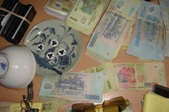 Tang vật tại hiện trường. (Ảnh: Văn Đức/Vietnam+)