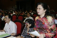 Đại biểu Quốc hội tỉnh Cao Bằng Nguyễn Thị Nương phát biểu ý kiến. (Ảnh: Thống Nhất/TTXVN)
