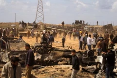 Cảnh tàn phá tại Al-Wayfiyah, cách Benghazi 35km về phía tây sau cuộc không kích của máy bay Pháp ngày 21/3. (Ảnh: AFP/TTXVN)