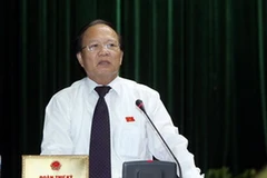 Bộ trưởng Bộ Văn hóa, Thể thao và Du lịch Hoàng Tuấn Anh trả lời chất vấn của đại biểu Quốc hội. (Ảnh: Nhan Sáng/TTXVN).