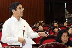 Đại biểu Quốc hội tỉnh An Giang Lê Bộ Lĩnh phát biểu ý kiến. (Ảnh: Thái Bình/TTXVN).