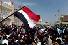 Biểu tình phản đối chính quyền của Tổng thống Bashar al-Assad ở Qamishli. (Nguồn: AFP/TTXVN)