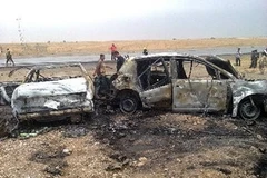 Hiện trường vụ đánh bom ở khu vực Samarra, phía bắc thủ đô Baghdad ngày 20/5. (Nguồn: AFP/TTXVN)