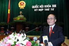 Chủ tịch Quốc hội Nguyễn Sinh Hùng đọc Diễn văn khai mạc kỳ họp. (Ảnh: Nhan Sáng/TTXVN) 