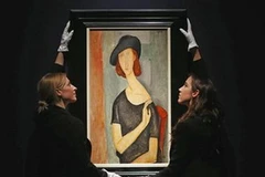 Bức chân dung “Jeanne Hebuterne đội mũ". (Nguồn: Reuters)