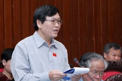 Đại biểu Quốc hội tỉnh Kon Tum Tô Văn Tám phát biểu ý kiến. (Ảnh: Nhan Sáng/TTXVN)