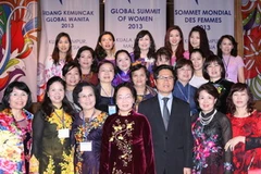 Phó Chủ tịch nước Nguyễn Thị Doan và các đại biểu tại lễ bế mạc. (Ảnh: Thống Nhất/TTXVN)