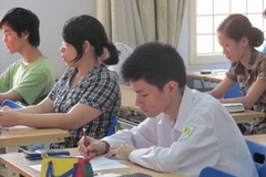 Thí sinh dự thi đại học năm 2012. (Ảnh: Phạm Mai/Vietnam+)