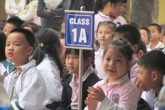 Học sinh vào lớp 1. (Ảnh: Phạm Mai/Vietnam+)