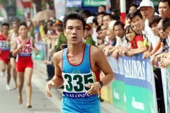 Vận động viên Đỗ Quốc Luật đoàn Bộ đội Biên phòng về nhất nội dung mở rộng nam. (Ảnh: Quốc Khánh/TTXVN)