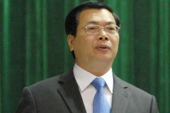 Bộ trưởng Bộ Công Thương Vũ Huy Hoàng trả lời chất vấn của các đại biểu Quốc hội. (Ảnh: Doãn Tấn/TTXVN).