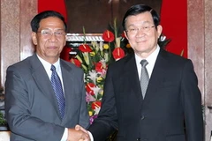 Chủ tịch nước Trương Tấn Sang và trưởng Đoàn đại biểu Đảng nhân dân Campuchia. (Ảnh: Nguyễn Khang/TTXVN)