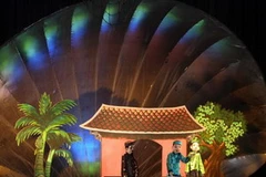 Một cảnh trong trích đoạn vở rối "Nàng Hến". (Ảnh: Nhật Anh/TTXVN) 