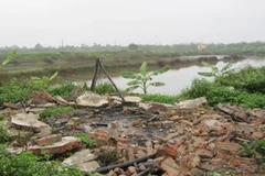 Khu chòi canh đầm của gia đình nhà ông Đoàn Văn Vươn bị phá hủy. (Nguồn: Chinhphu.vn)