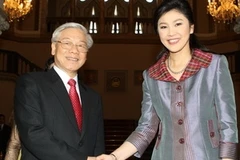 Tổng Bí thư Nguyễn Phú Trọng và Thủ tướng Thái Lan Yingluck Shinawatra. (Ảnh: Trí Dũng/TTXVN)