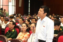 Đại biểu Quốc hội tỉnh Hải Dương Nguyễn Văn Hợp phát biểu ý kiến. (Ảnh: Nguyễn Dân/TTXVN).