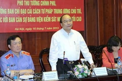 Phó Thủ tướng Nguyễn Xuân Phúc phát biểu tại buổi làm việc. (Ảnh: An Đăng/TTXVN)