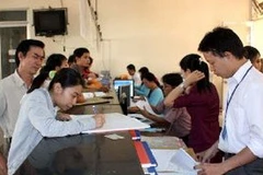 Phòng tiếp nhận và trả các thủ tục hành chính theo cơ chế một cửa của UBND huyện Thuận An, tỉnh Bình Dương. (Ảnh: Quách Lắm/TTXVN)