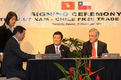 Chủ tịch nước Trương Tấn Sang và Tổng thống Sebastián Piñera chứng kiến ký FTA giữa hai nước. (Nguồn: Trang web Chính phủ Chile)