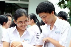 Thí sinh tham gia kỳ thi đại học 2011. (Ảnh: Phương Vy/TTXVN)