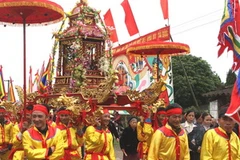 Rước kiệu của các xã trong hội Phủ Dầy. (Ảnh: Trọng Đức/TTXVN).