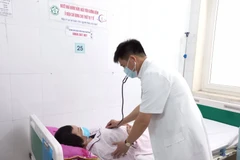 Bệnh nhân mắc ung thư vú đang điều trị tại Trung tâm Y học hạt nhân và Ung bướu, Bệnh viện Bạch Mai. (Ảnh: T.G/Vietnam+)