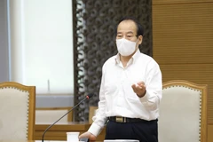 Phó giáo sư Trần Đắc Phu-Cố vấn cao cấp Trung tâm đáp ứng khẩn cấp sự kiện y tế công cộng Việt Nam phát biểu. (Ảnh: Nguyễn Điệp/TTXVN)