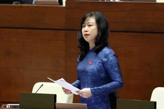Bộ trưởng Bộ Y tế Đào Hồng Lan phát biểu giải trình, làm rõ một số vấn đề đại biểu Quốc hội nêu. (Ảnh: Phạm Kiên/TTXVN)