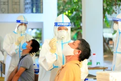 Tổ chức Y tế thế giới nhận định dịch COVID-19 sẽ không biến mất hoàn toàn. (Ảnh: TTXVN/Vietnam+)