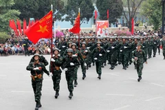 Khối Chiến sĩ đặc công tham gia diễu binh trên đường phố. (Ảnh: Trung Kiên/TTXVN)