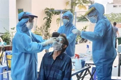 Lấy mẫu xét nghiệm cho người dân tại Thành phố Hồ Chí Minh. (Ảnh: TTXVN/Vietnam+)