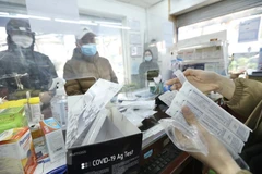 Hà Nội trong ngày ghi nhận 12.850 ca mắc COVID-19. (Ảnh: Minh Quyết/TTXVN)