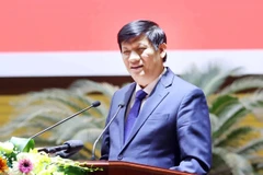 Bộ trưởng Bộ Y tế Nguyễn Thanh Long phát biểu khai mạc hội nghị. (Ảnh: Thống Nhất/TTXVN)