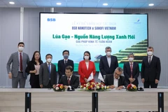 Các đại biểu tại buổi lễ ký kết. (Ảnh: PV/Vietnam+)