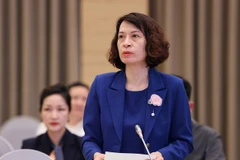 Thứ trưởng Bộ Y tế Nguyễn Thị Liên Hương trả lời tại buổi họp báo. (Ảnh: VGP)