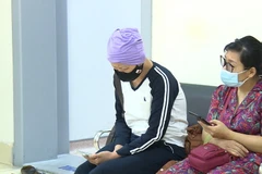 Bệnh nhân ung thư đang điều trị tại Bệnh viện K. (Ảnh: PV/Vietnam+)