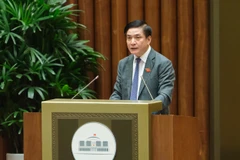 Tổng Thư ký Quốc hội, Chủ nhiệm Văn phòng Quốc hội Bùi Văn Cường trình bày Báo cáo tiếp thu, giải trình ý kiến các vị đại biểu Quốc hội về dự kiến Chương trình giám sát của Quốc hội năm 2023. (Ảnh: quochoi.vn)