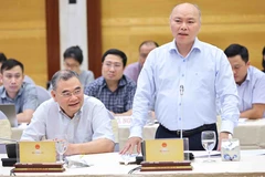 Chánh Văn phòng, Người phát ngôn Bộ Nội vụ Vũ Đăng Minh trả lời câu hỏi của các nhà báo. (Ảnh: Minh Đức/TTXVN)